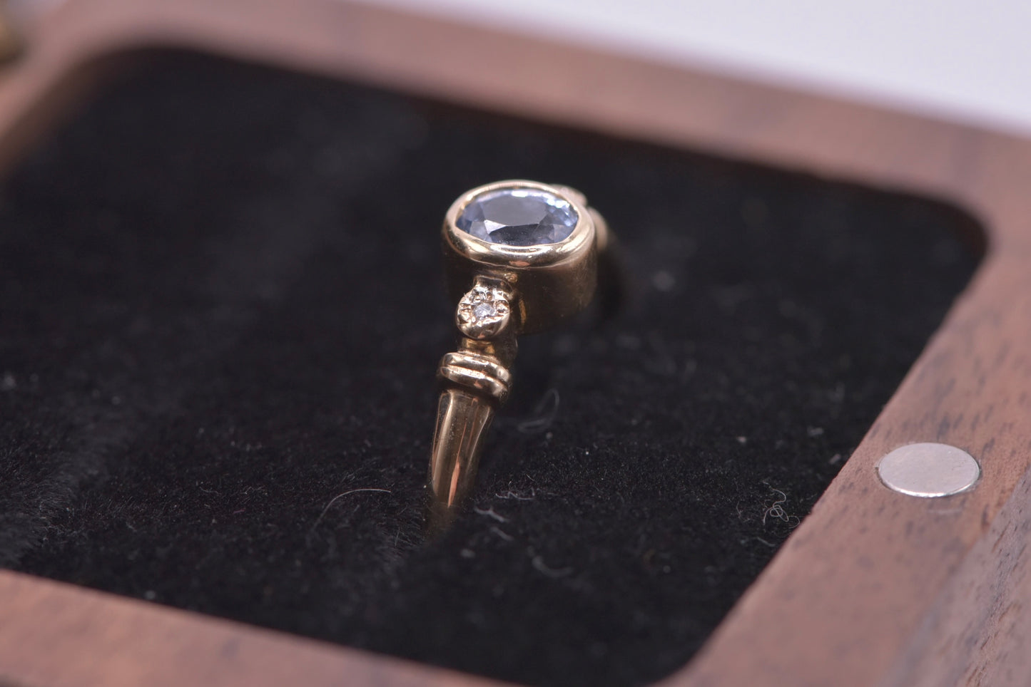 Petal - 9ct yellow gold blue sapphire with diamond ring