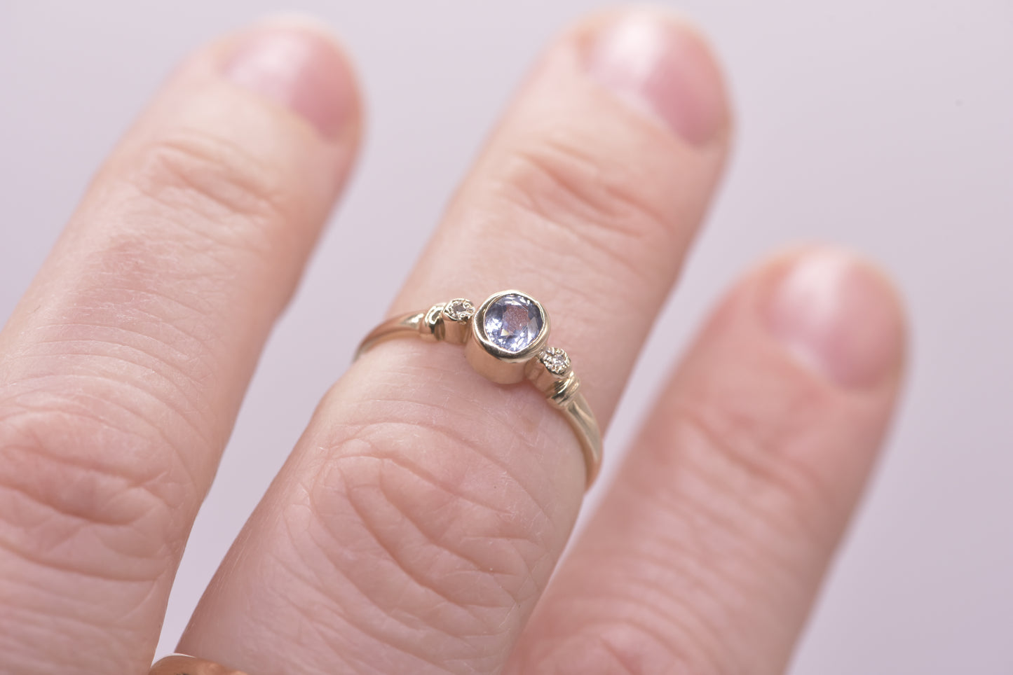 Petal - 9ct yellow gold blue sapphire with diamond ring