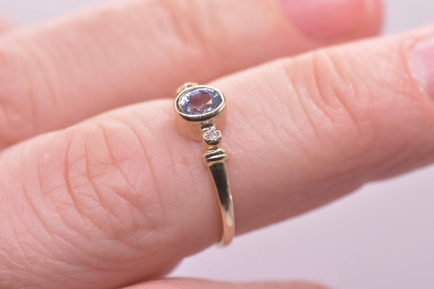 Petal - 9ct yellow gold blue sapphire with diamond ring