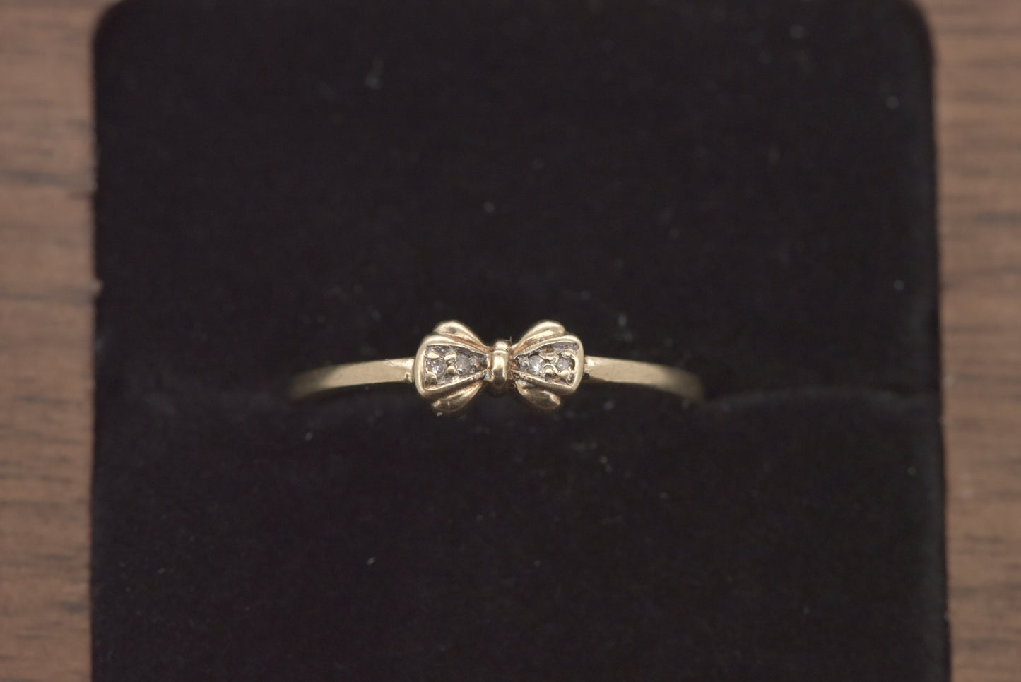 Georgie - 9ct tiny bow ring with diamonds