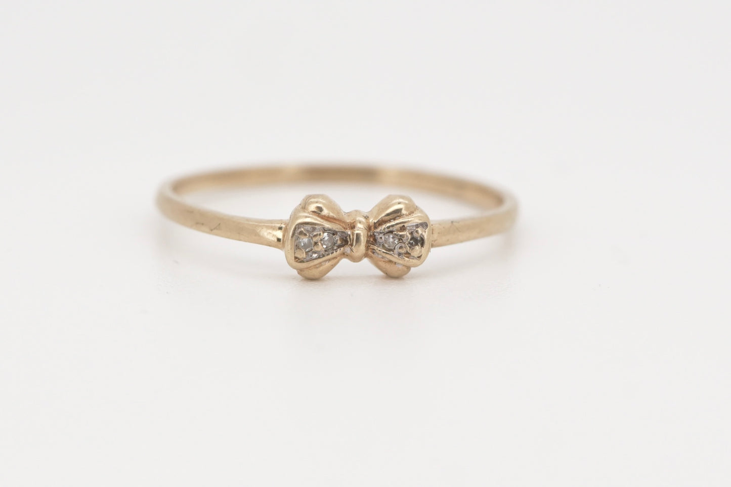 Georgie - 9ct tiny bow ring with diamonds