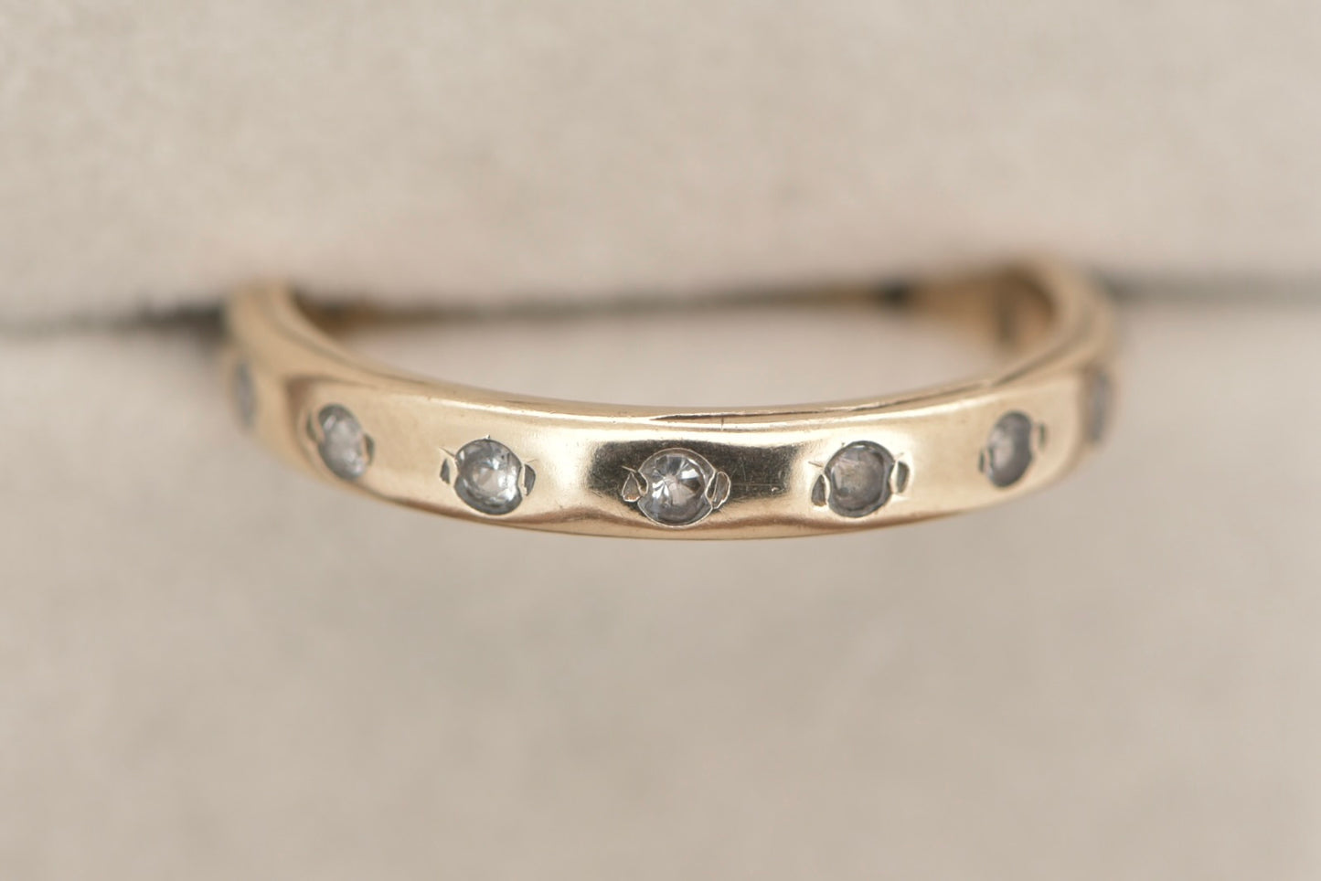 Unity - Eternity band with 15 clear flush set gemstones - gold ring