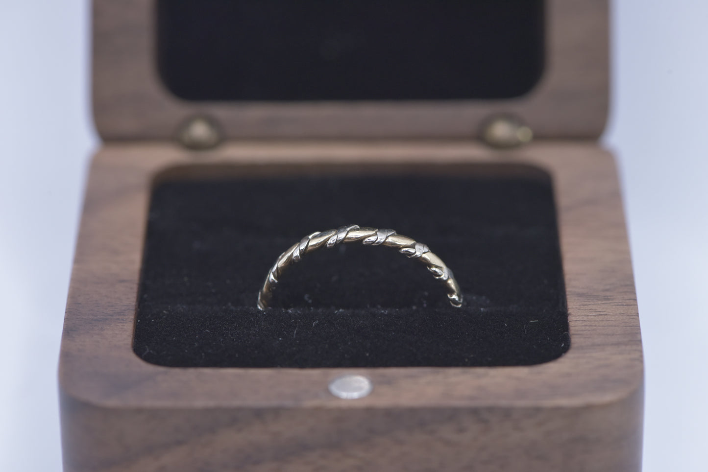 Theda  -  9ct yellow and white gold twist band