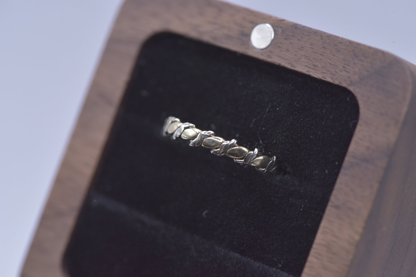 Theda  -  9ct yellow and white gold twist band