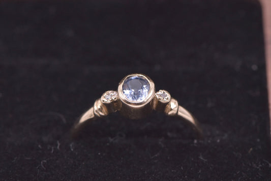 Petal - 9ct yellow gold blue sapphire with diamond ring