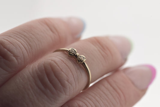 Georgie - 9ct tiny bow ring with diamonds