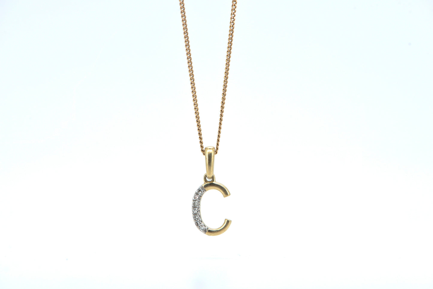 Letter C yellow gold with diamonds