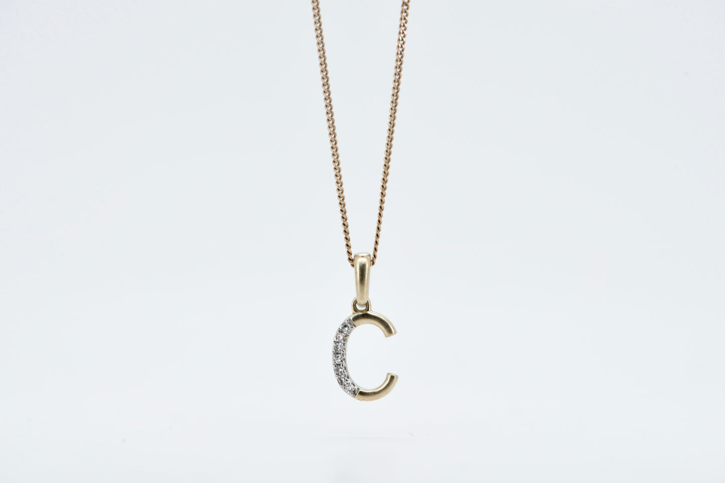 Letter C yellow gold with diamonds