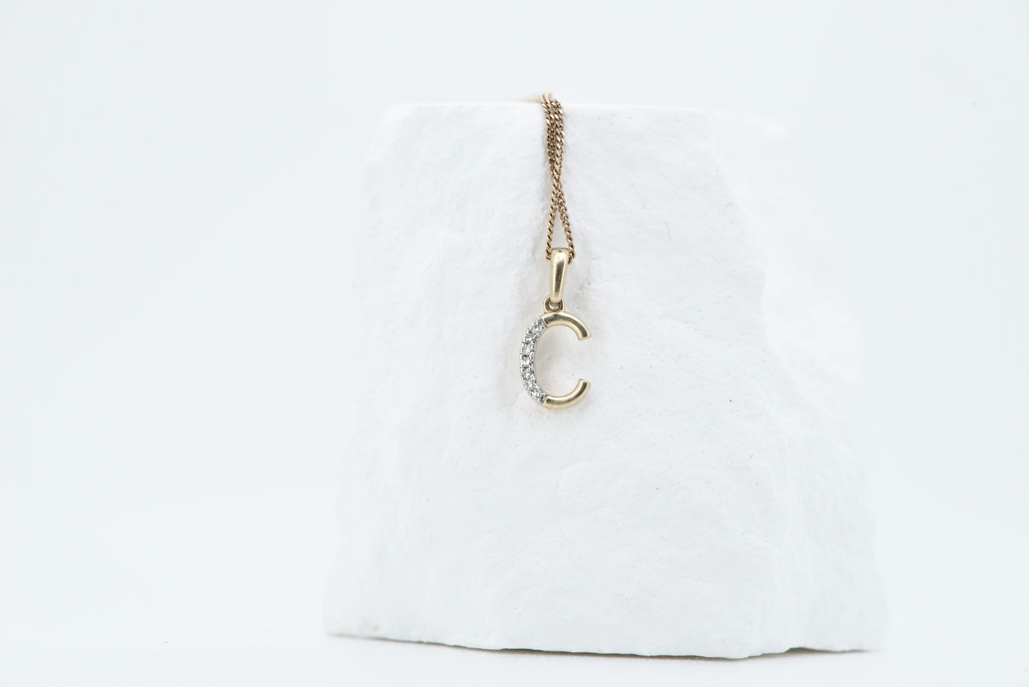 Letter C yellow gold with diamonds