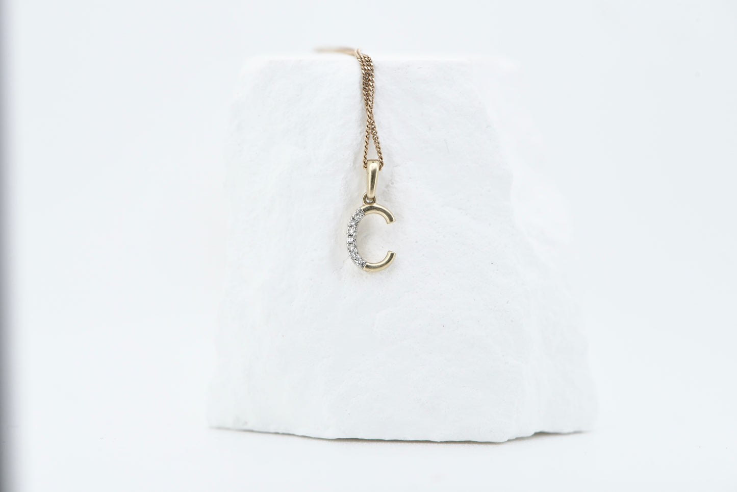 Letter C yellow gold with diamonds