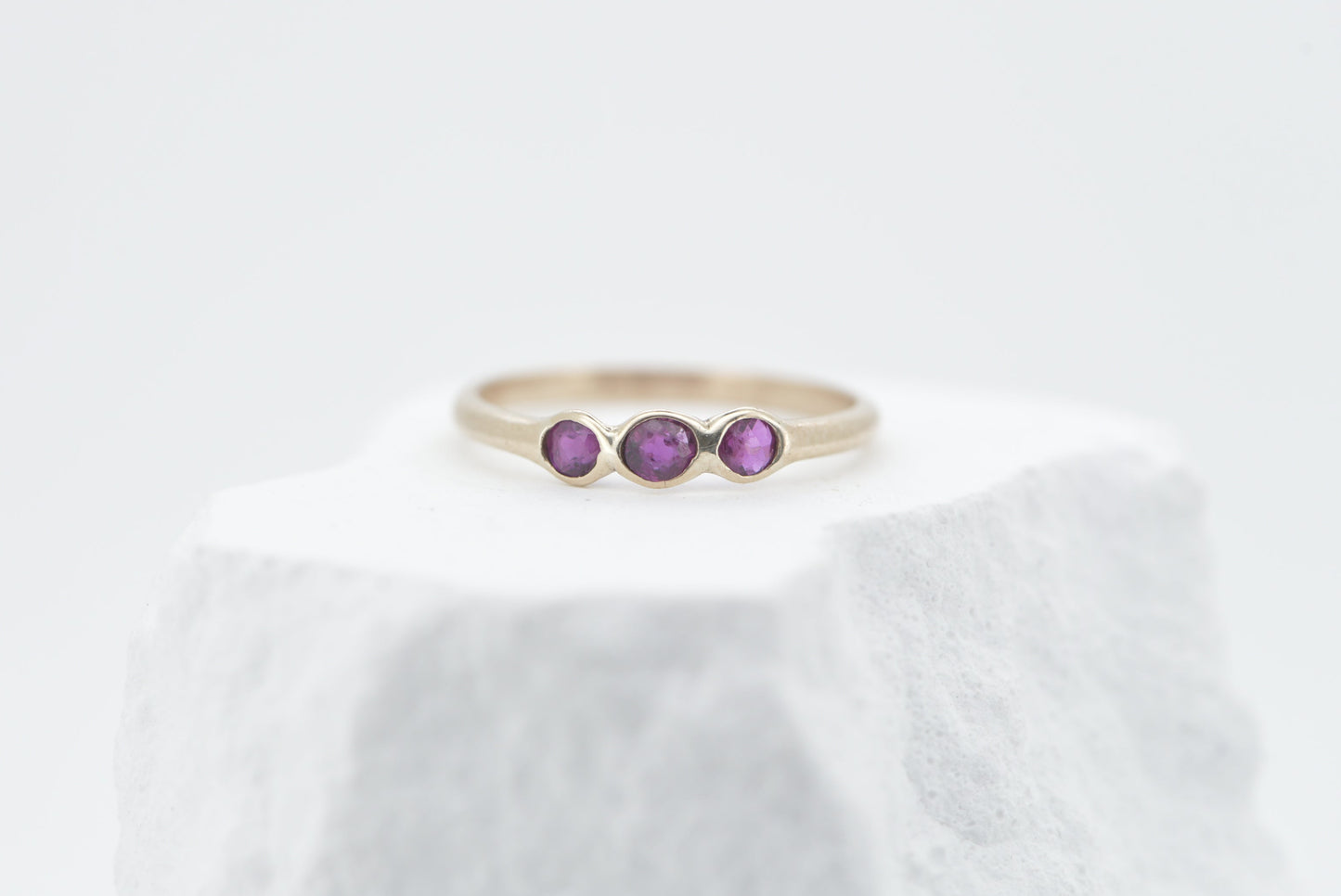 Rosie - 9ct yellow gold ring with three old cut rubies