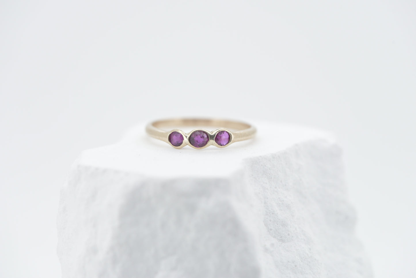 Rosie - 9ct yellow gold ring with three old cut rubies