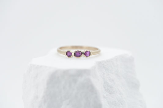 Rosie - 9ct yellow gold ring with three old cut rubies